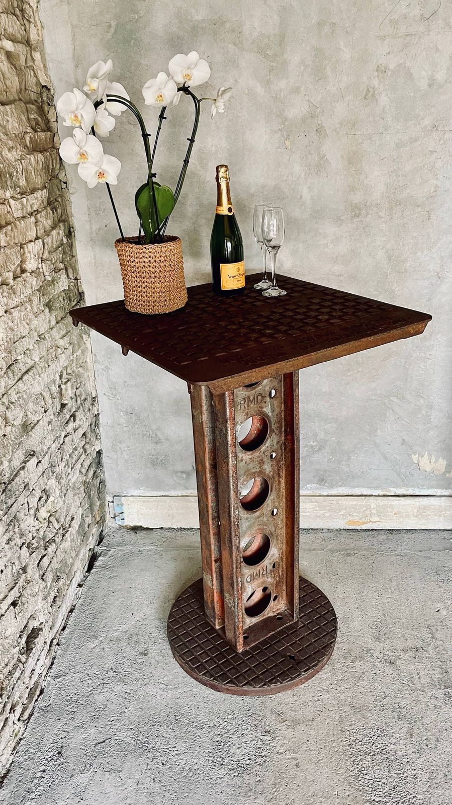 Dino Reclaimed Manhole Bar Table With A Heavy Steel Pedestal Base photo vinterior