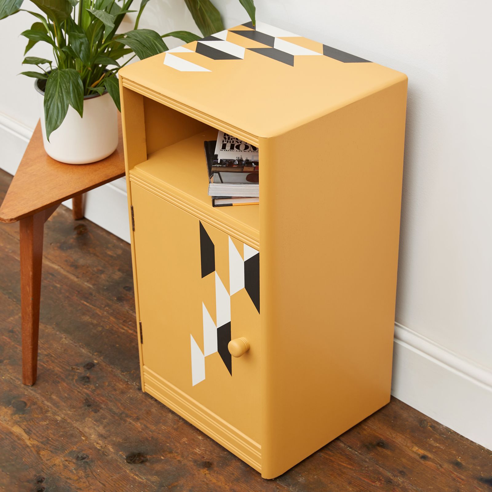 Mustard Yellow Wooden Bedside Table With Hand Painted Geometric Design In Black And White photo for sale
