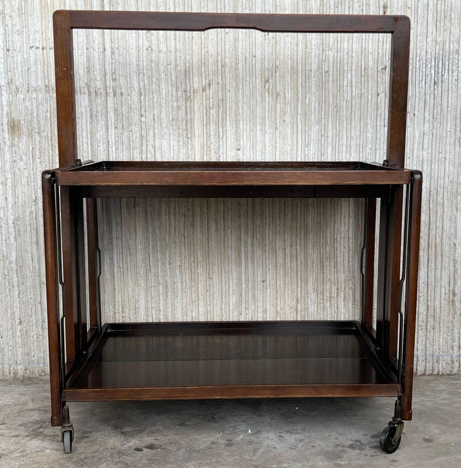 Chariot bar mid-century modern pliant à deux niveaux photo for sale