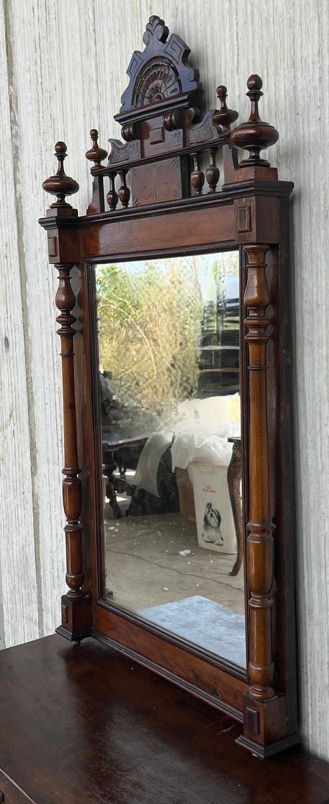 Early 20th French Ebonized Mirror With Turned Columns And High Carved Details photo vinterior