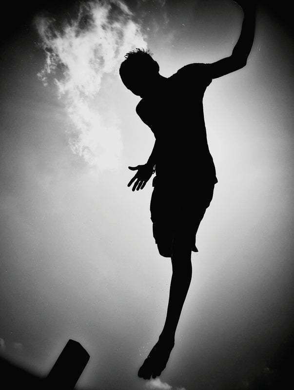 "Silhouette Of Person Jumping" By Anas Nasheed / Eyeem