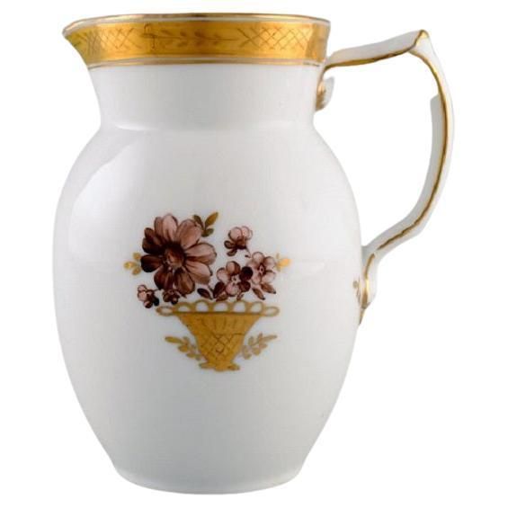 Royal Copenhagen Golden Basket Jug In Porcelain With Flowers And Gold Decoration
