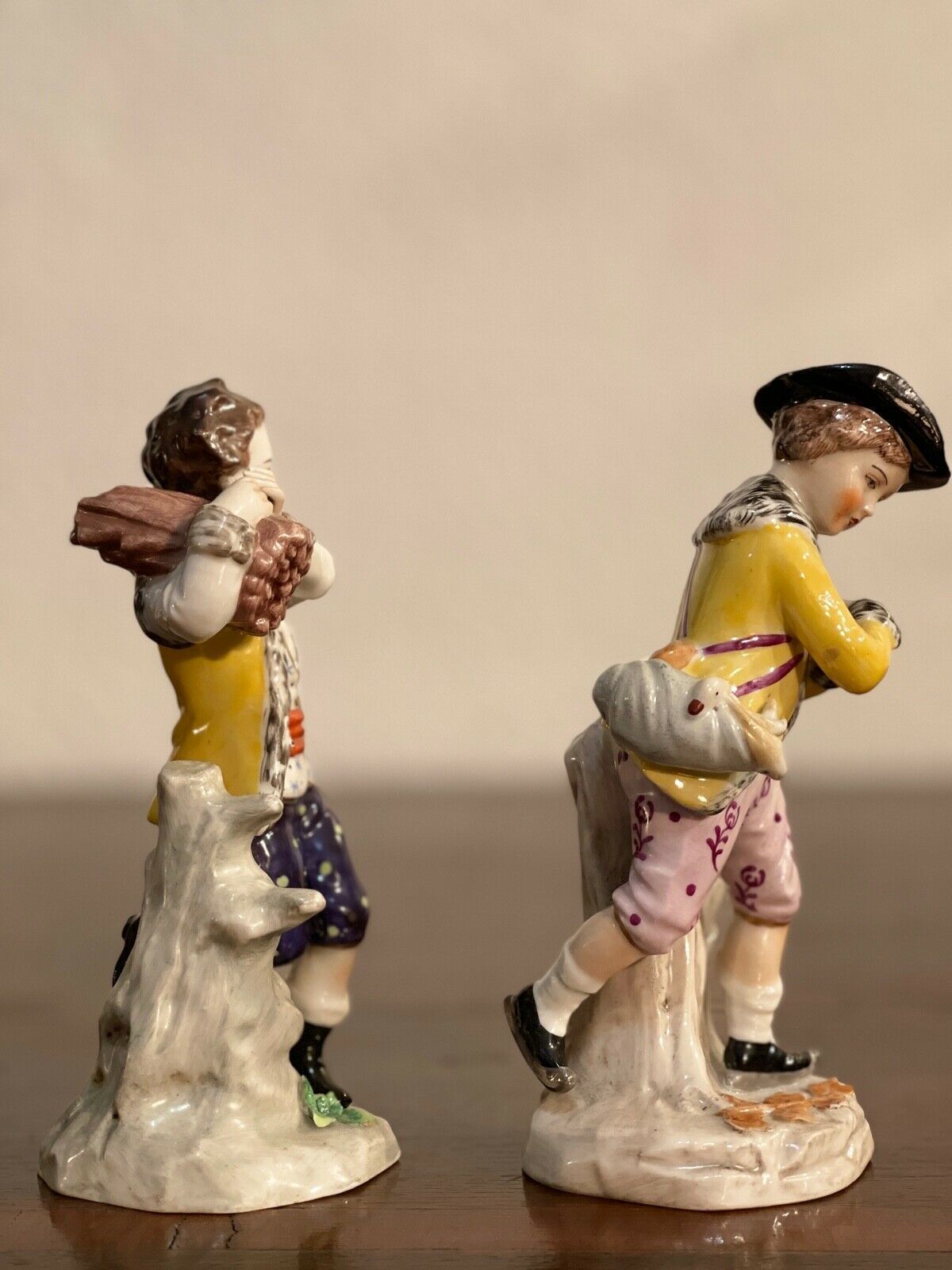 Pair Of Capodimonte Ceramics, Pair Of Kids "Hat And Wood photo for sale