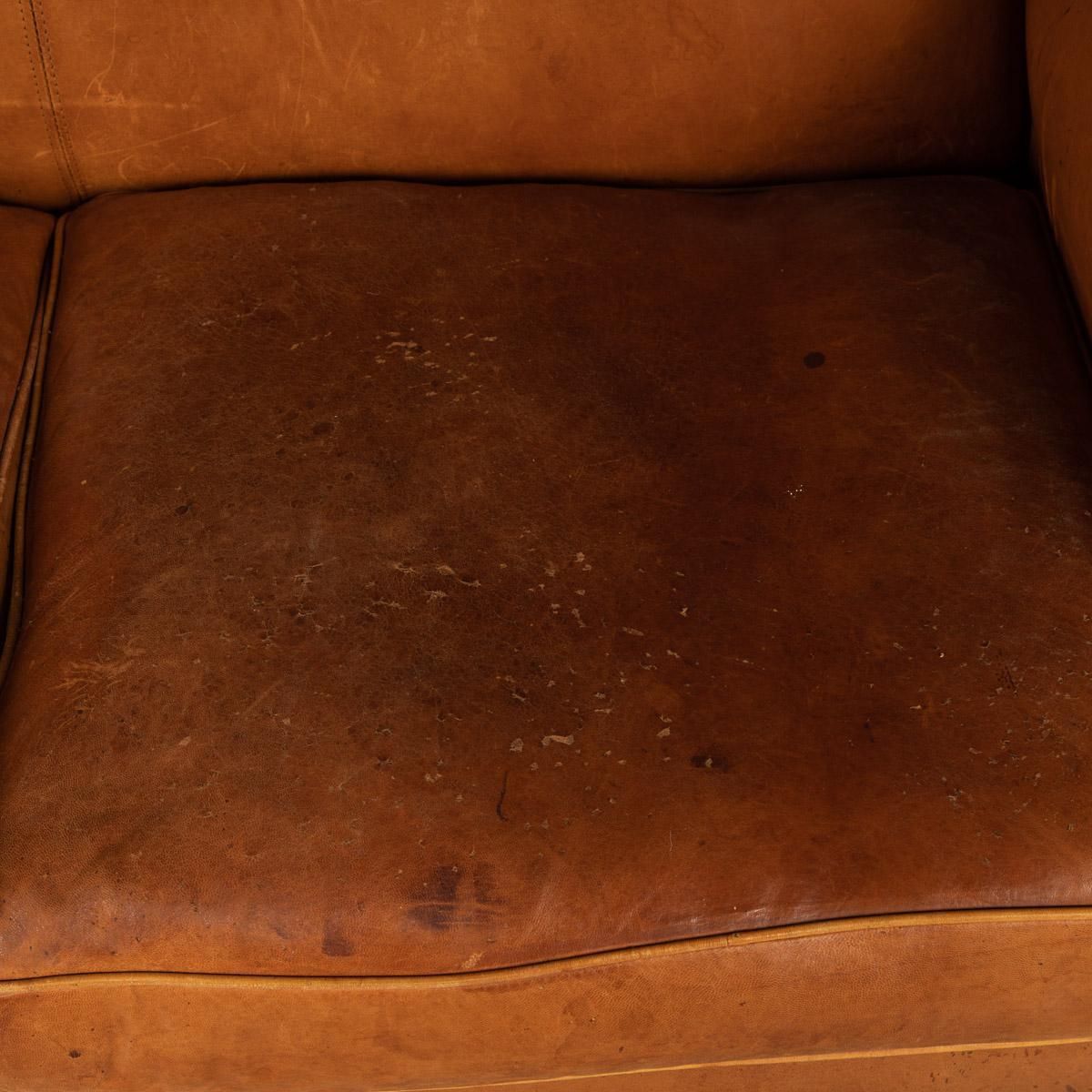photo furniture 20th Century France Two Seater Tan Sheepskin Leather Sofa