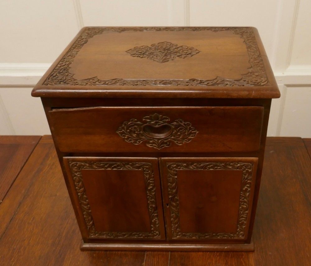 Small Carved Cupboard With Drawer photo furniture