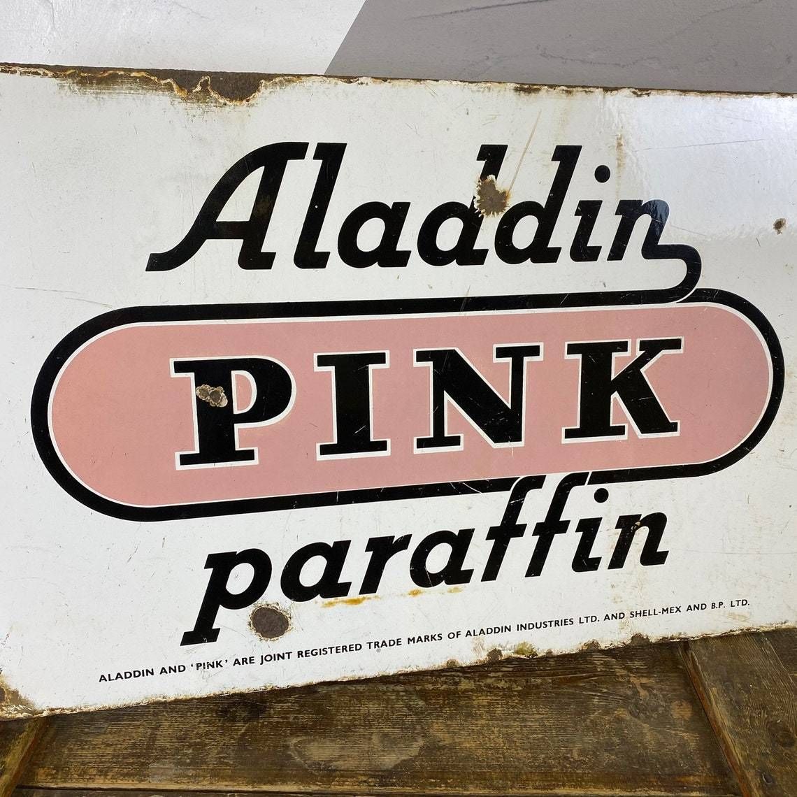 Vintage Aladdin Pink Enamel Metal Sign Advertising
