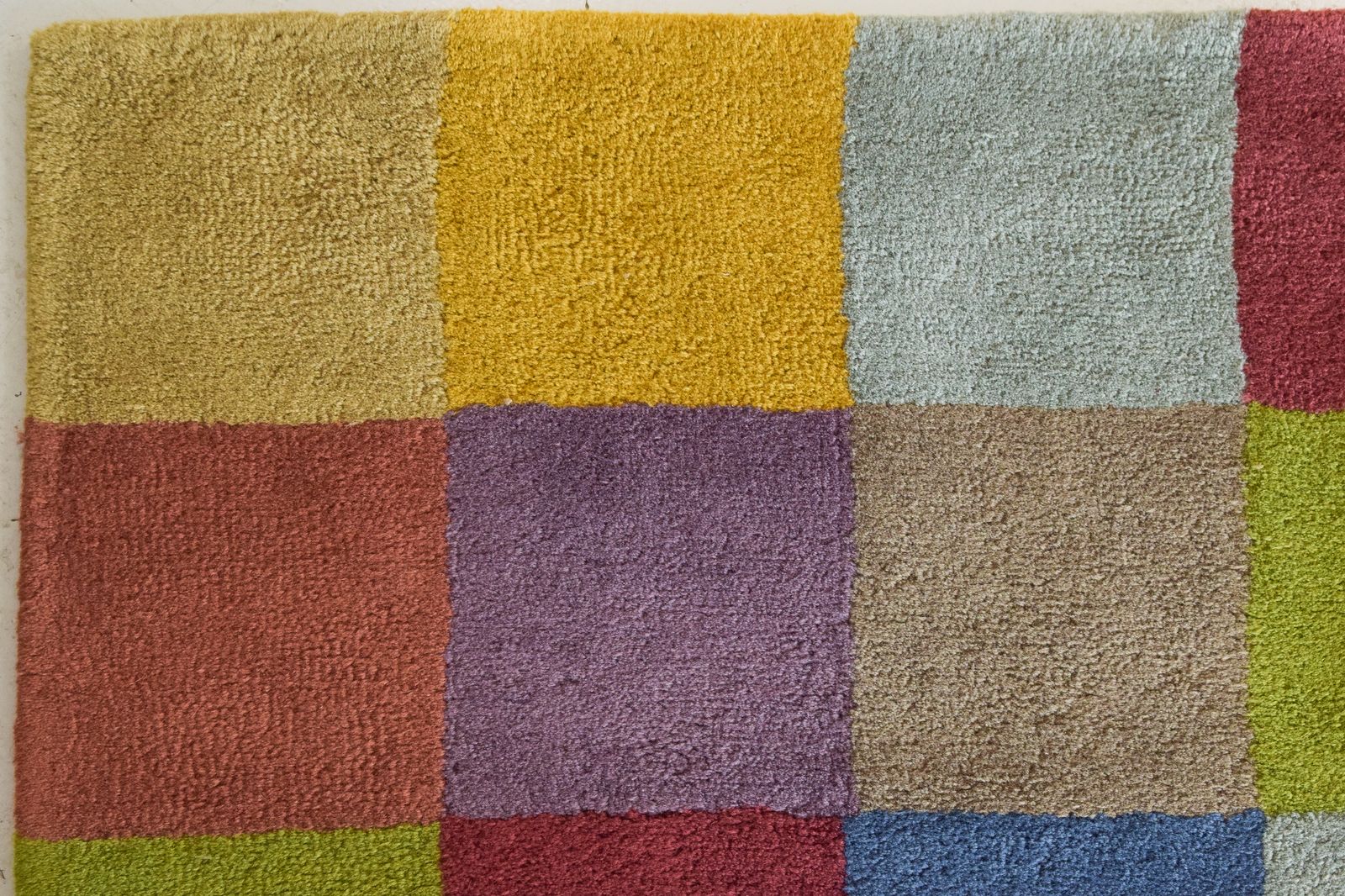 photo for sale Colourful Chequered Handwoven Rug