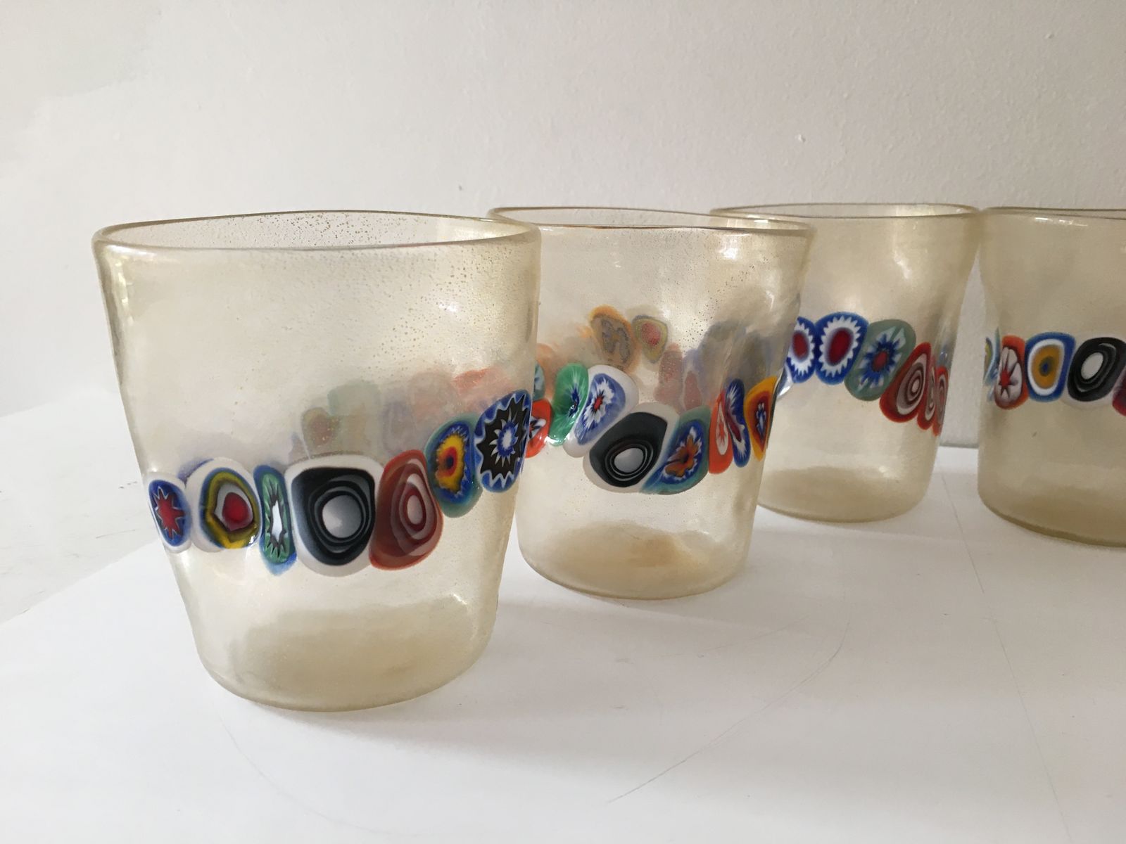 photo vinterior Transparent And Gold Leaf Murano Glasses With Necklace Of Large Floral Murrine Crumpled