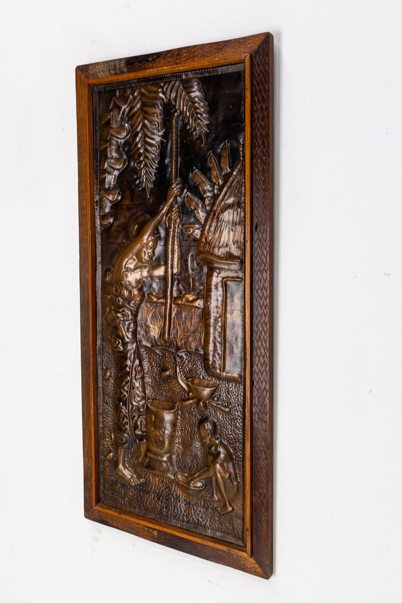 Representation Of An African Woman Embossed Copper And Iroko Frame photo for sale