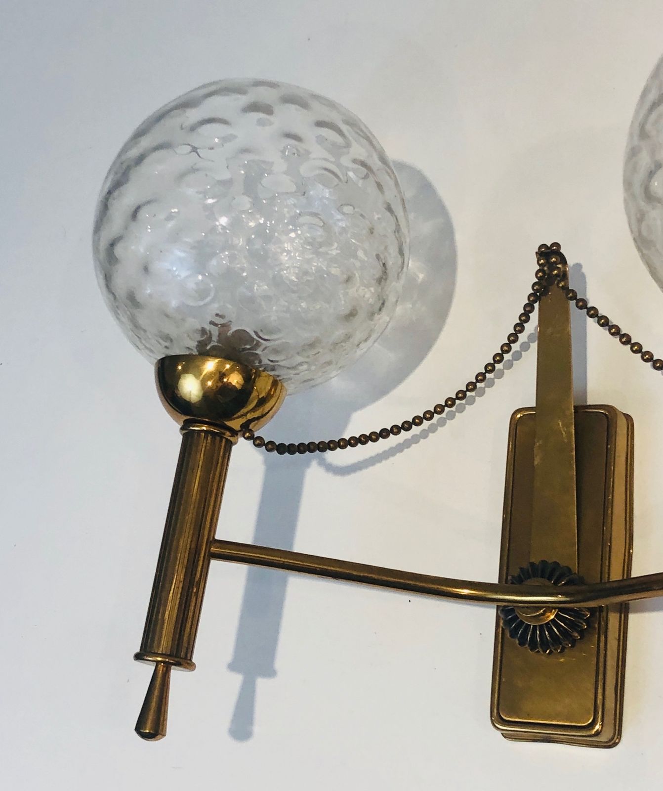 Pair Of Brass And Glass Ball Sconces. Around 1970 photo vinterior