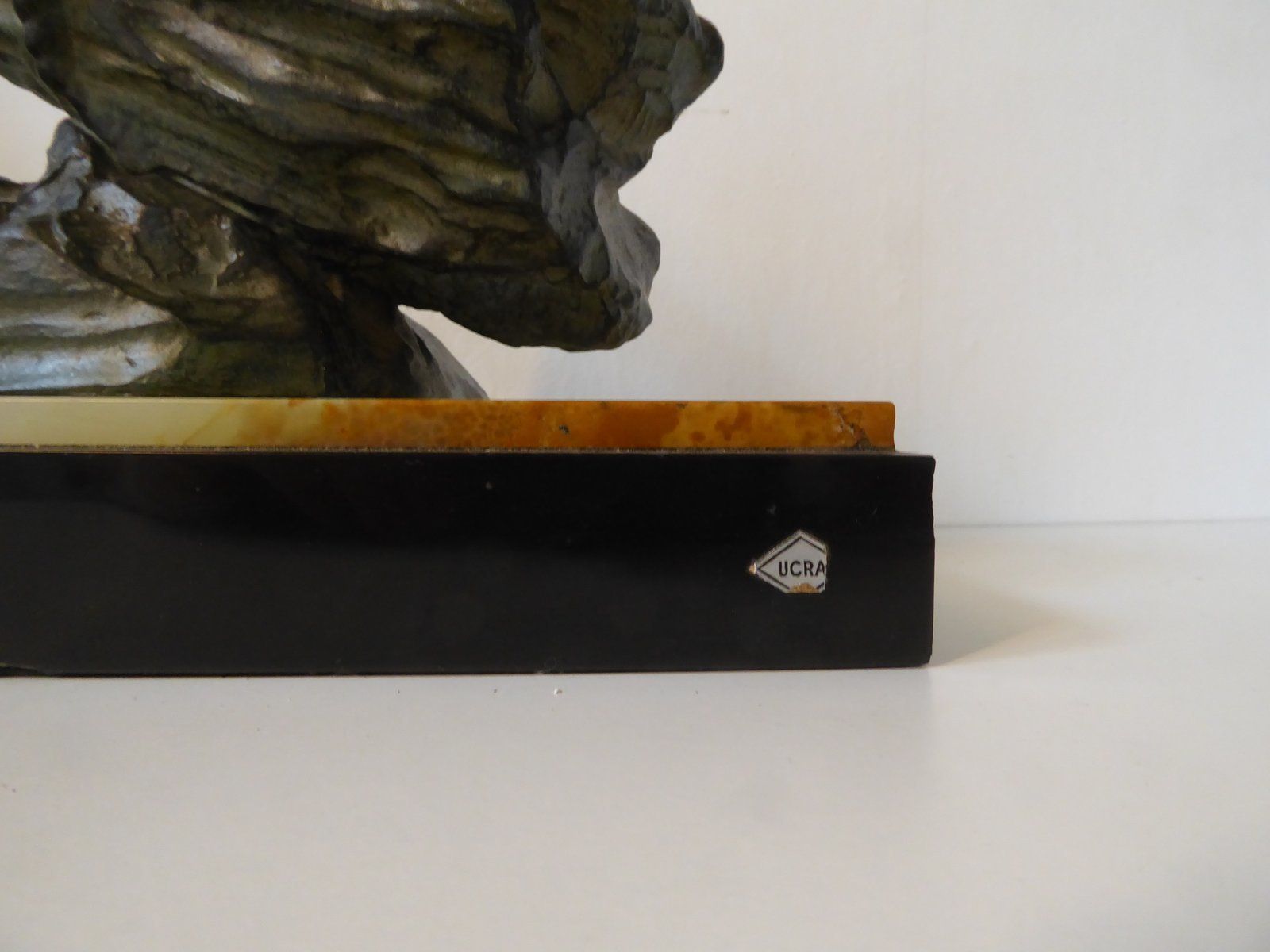 Art Deco Green Patinated Metal And Marble Sculpture Of Man Pulling Stone From Ucra, France photo for sale