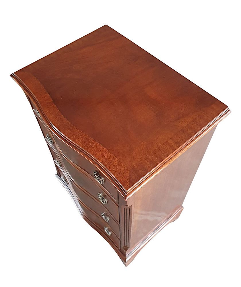 A Lovely Mid 20th Century Serpentine Chest Of Drawers photo Furniture