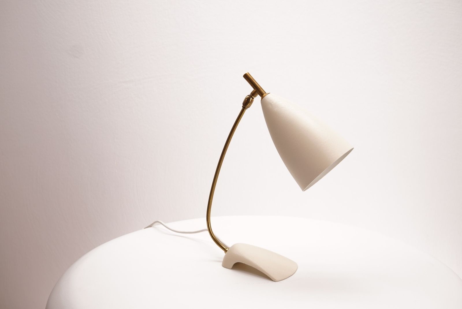 White Table Lamp In The Style Of Stilnovo photo Lighting
