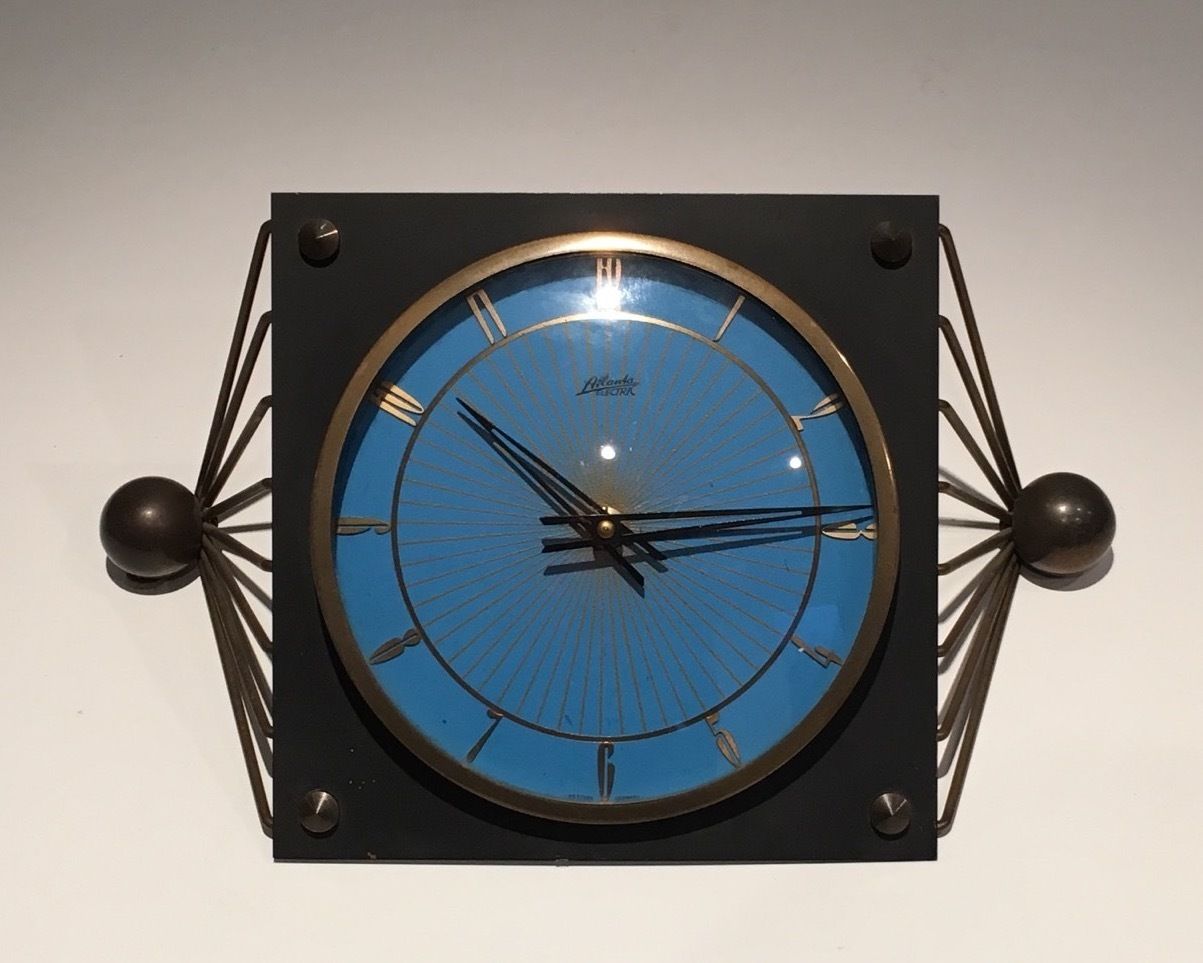 Clock In Lacquered Metal, Glass And Brass. Around 1950