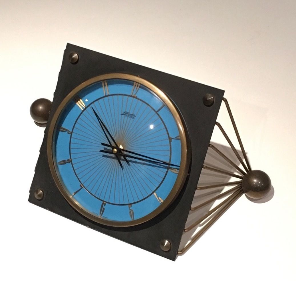 Clock In Lacquered Metal, Glass And Brass. Around 1950 photo furniture