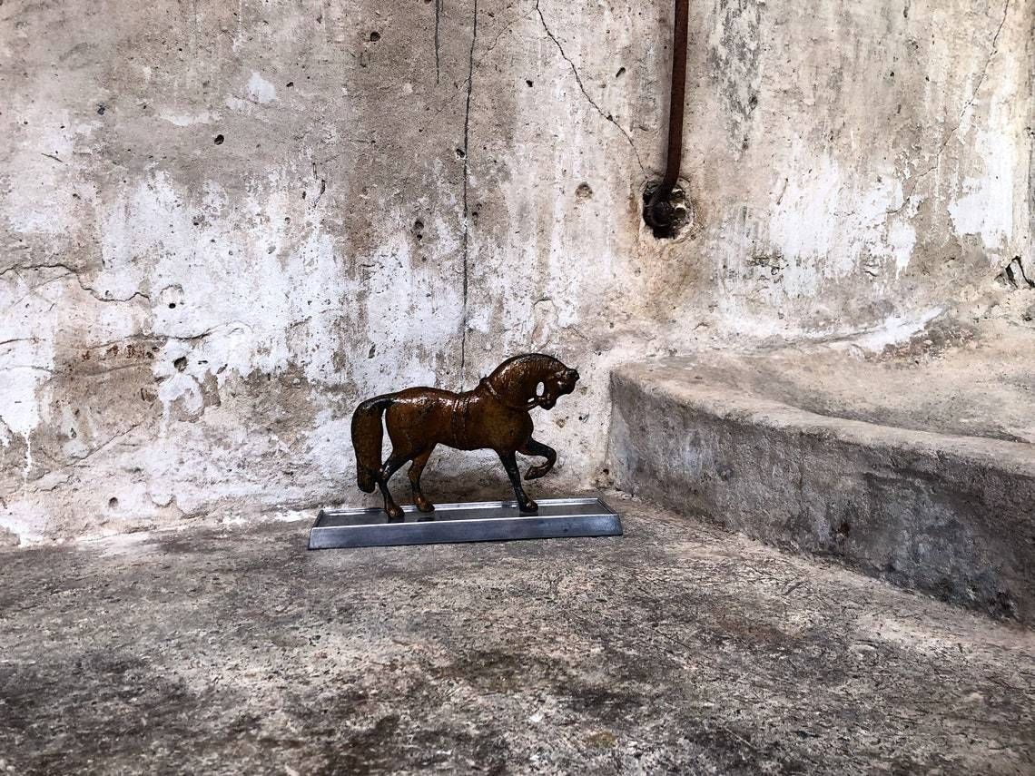 Antique Painted Rustic Metal Horse Statue On Stand photo vinterior
