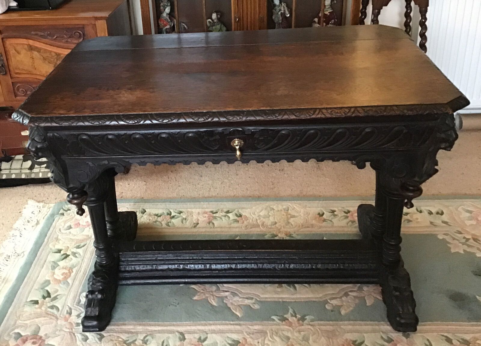 Heavily Carved Oak Writing Table. Fluted Column Legs Over Dolphin Feet C.1800