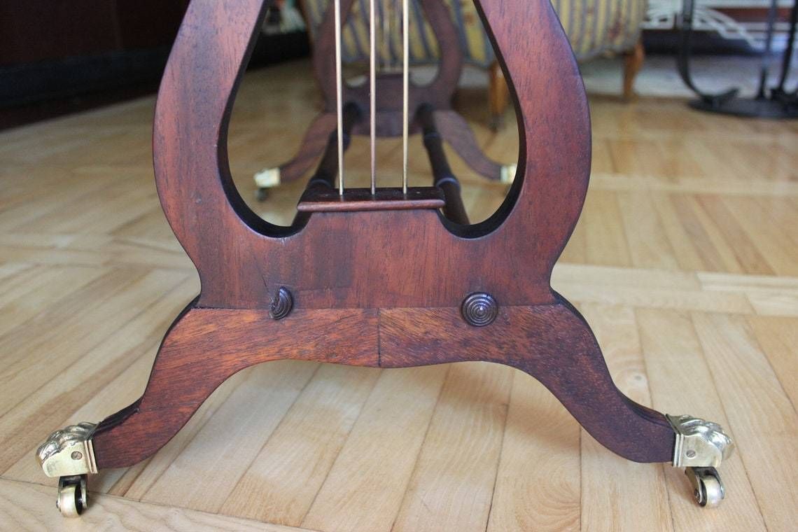 photo for sale Rare Coffee Table Lyre Harp Base Sheraton Style Table On Caster Wheels And Leather Top
