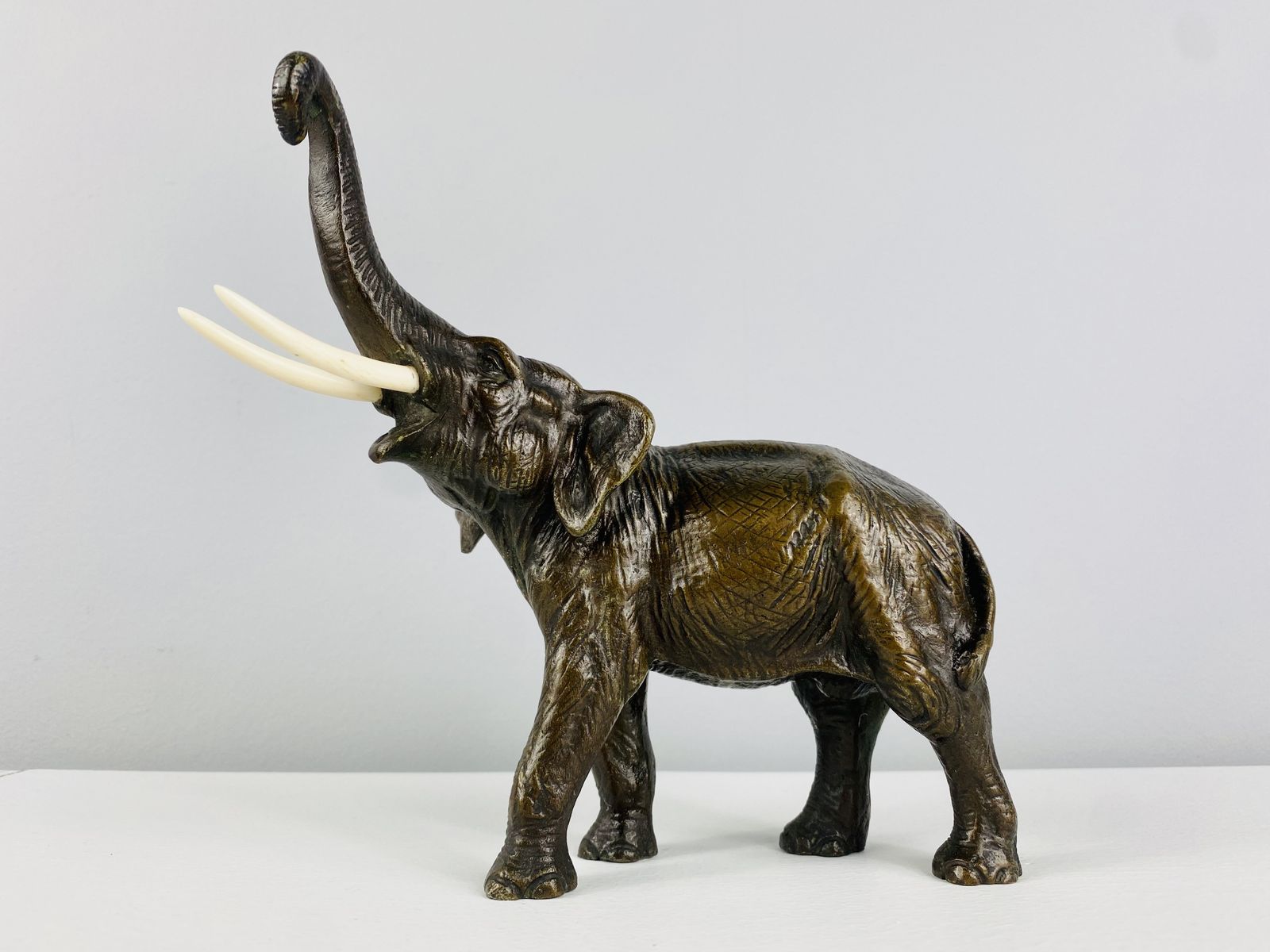 Sculpture Of A Bronze Elephant With Trunk Extended, Made In Austria Circa 1900.