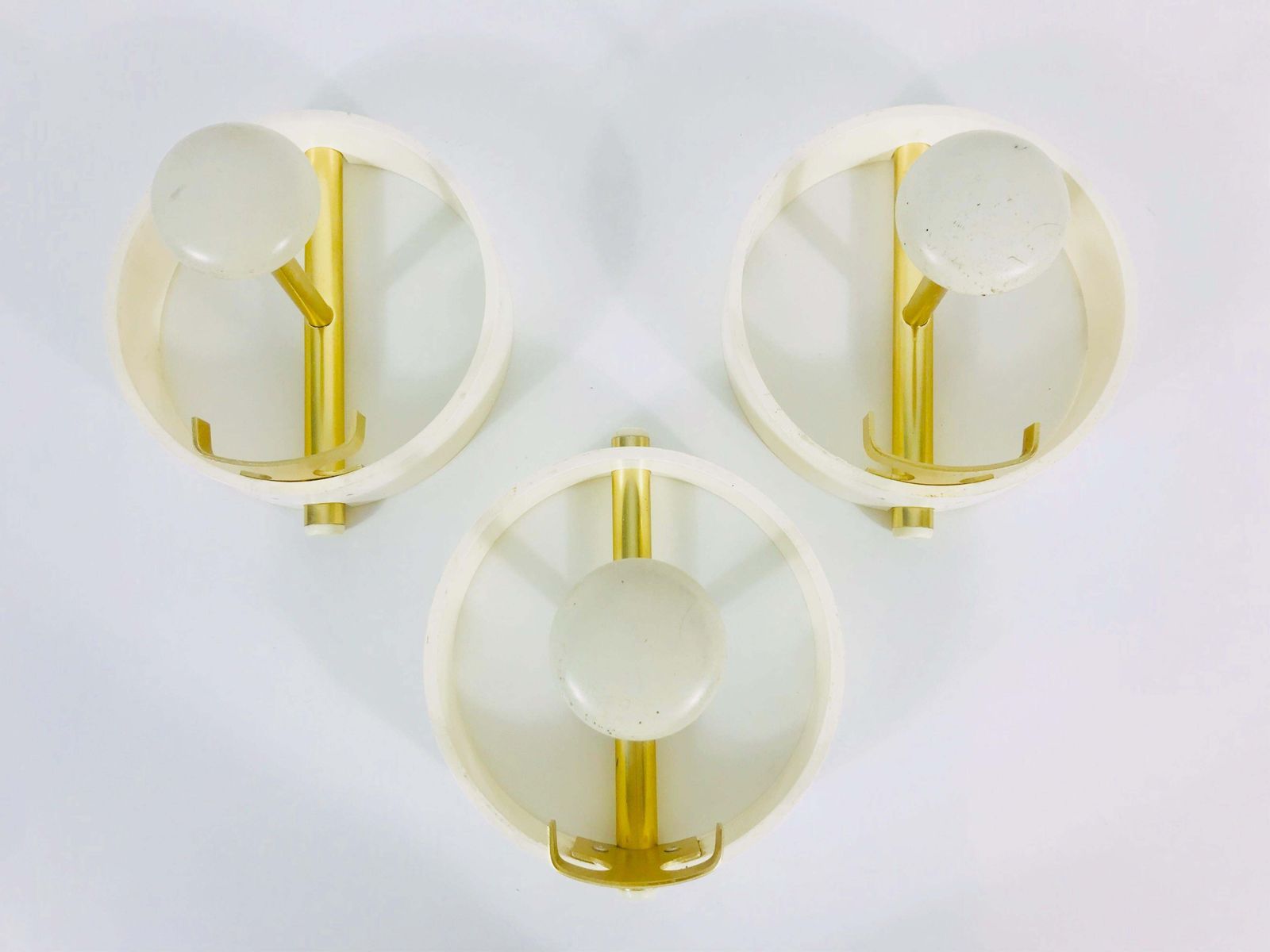 photo furniture Set Of 3 Large Circular Brass And Metal Coat Racks, Germany, 1960s
