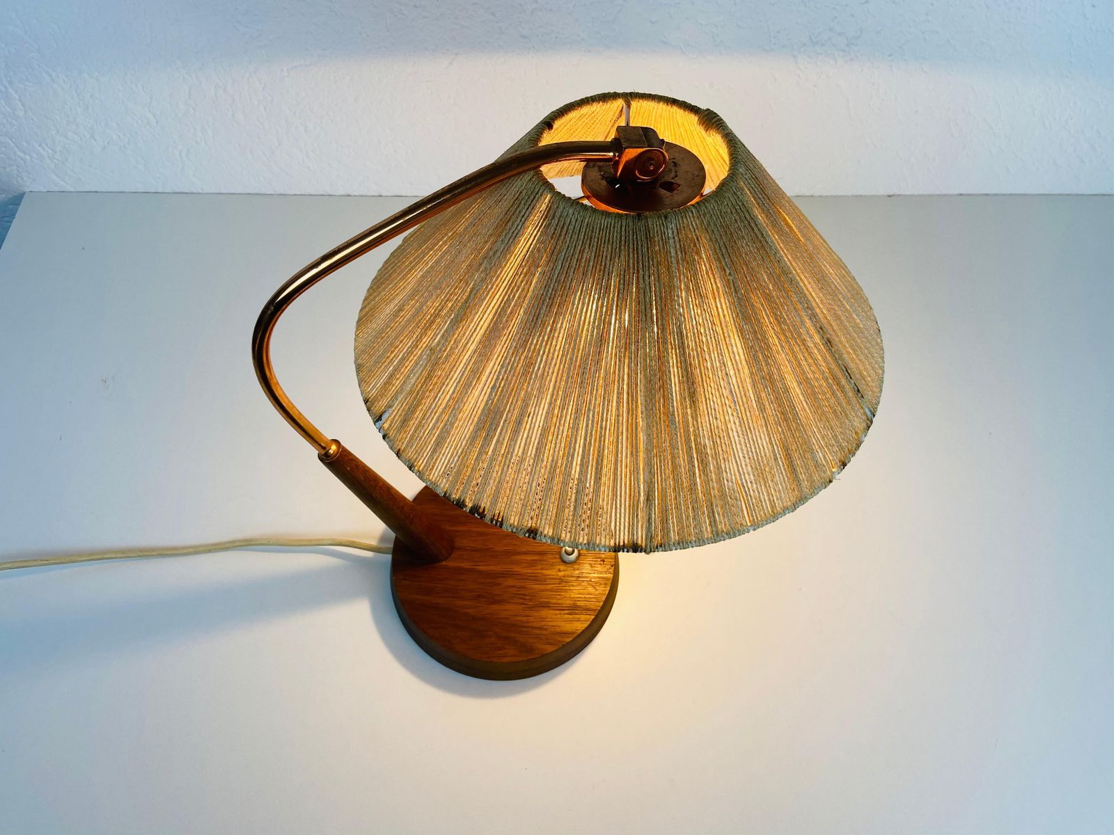 Lighting Midcentury Teak And Rattan Table Lamp By Temde, Circa 1970 photo