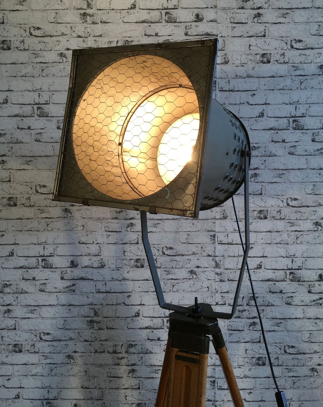 599.0 Large Grey Industrial Spotlight On Wooden Tripod, 2x photo