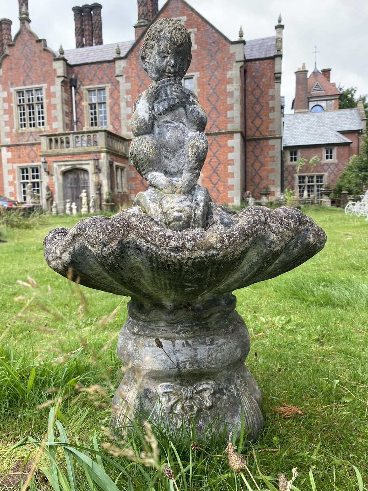 Mythological Water Feature Centrepiece Of Faun Boy Sat Upon Scalloped Bowl