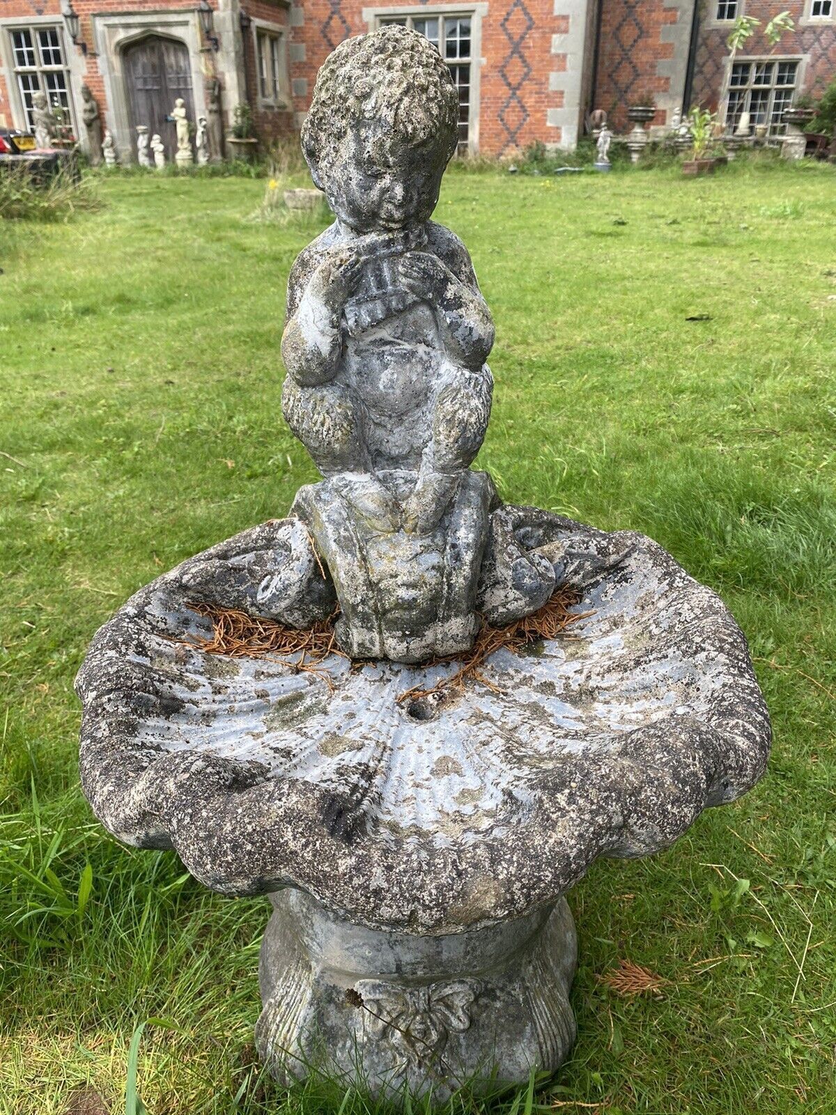 425.0 Mythological Water Feature Centrepiece Of Faun Boy Sat Upon Scalloped Bowl photo