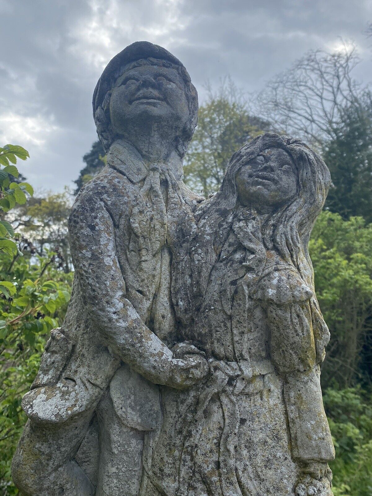 Vintage Jolly Farmer And His Wife Embracing Garden Statue photo for sale