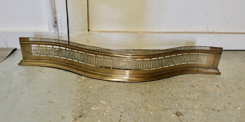 Victorian Pierced Serpentine Shaped Brass Fender