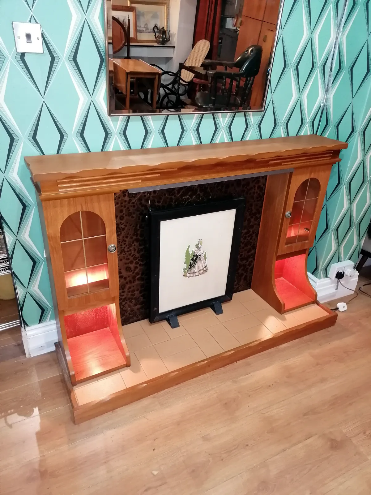 Fire Surround Display Unit Illumination In Storage Shelf Space photo vinterior