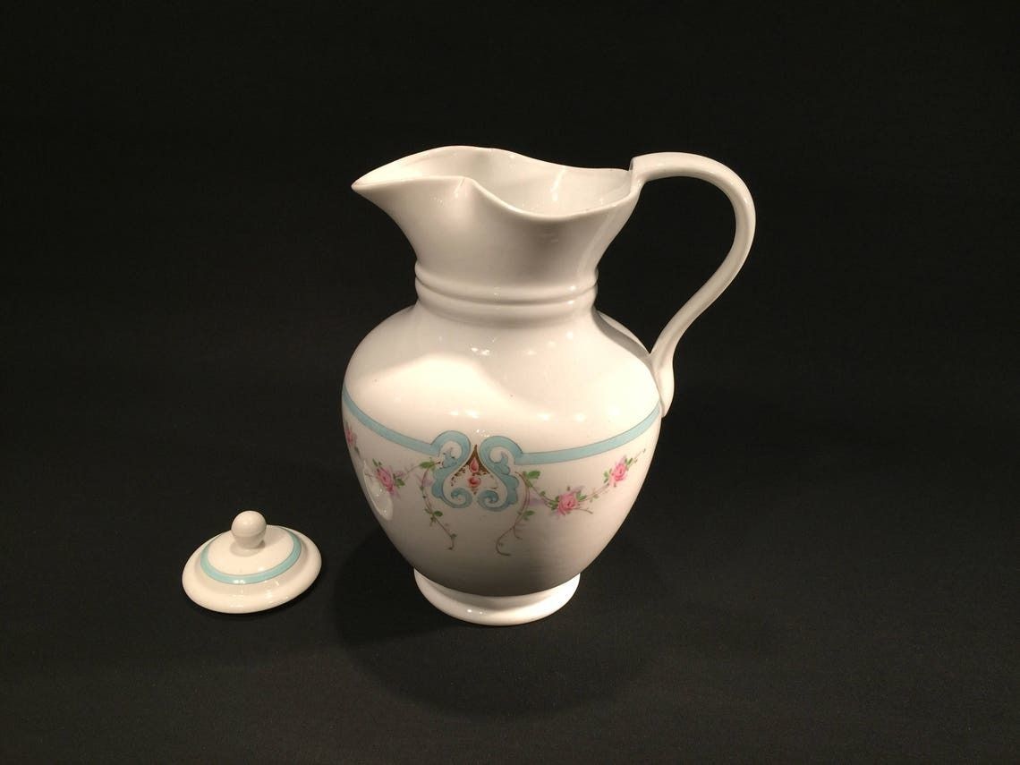 photo furniture Antique Porcelain Chocolate Jug By Danish Maker Bing And Grondahl In The 1800s, Pink And Light Blue Pattern
