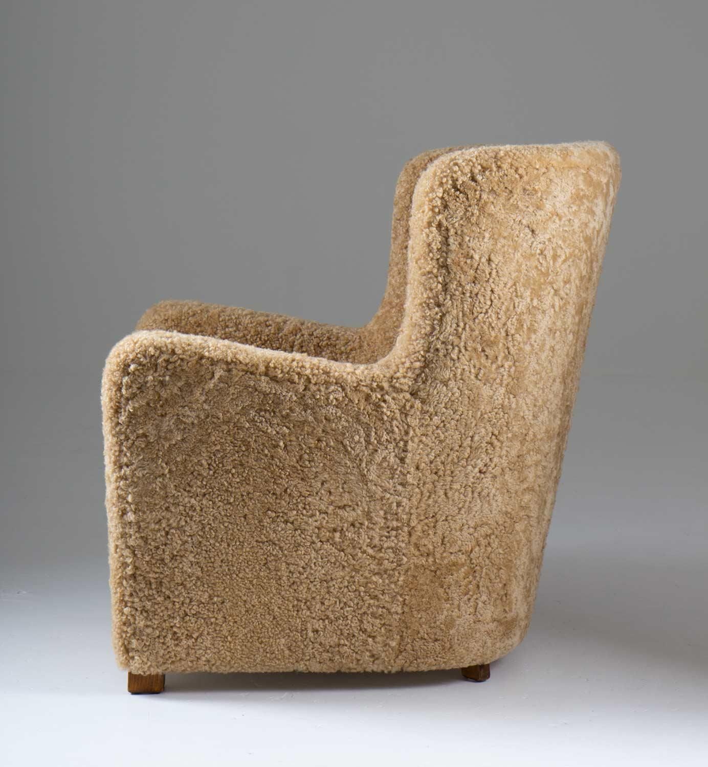 Scandinavian Mid Century Lounge Chair In Sheepskin photo for sale
