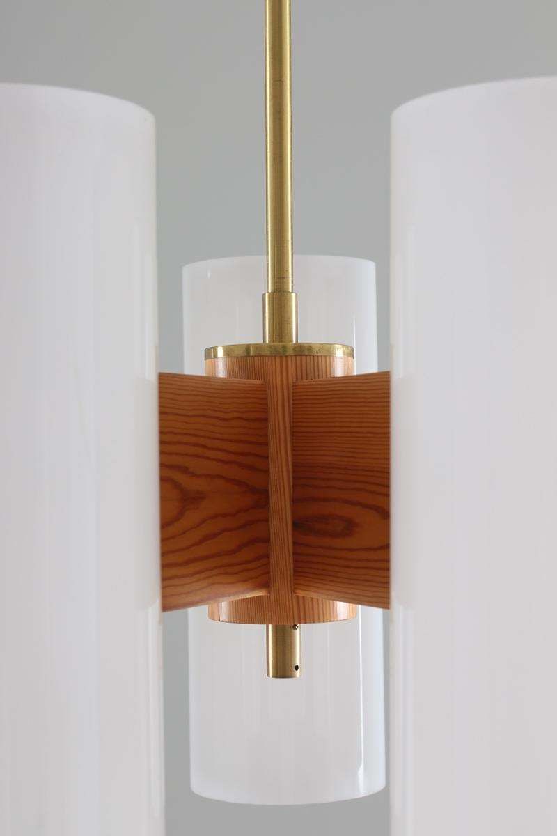 Pair Of Large Swedish Midcentury Chandeliers In Acrylic, Pine And Brass By Luxus photo vintage