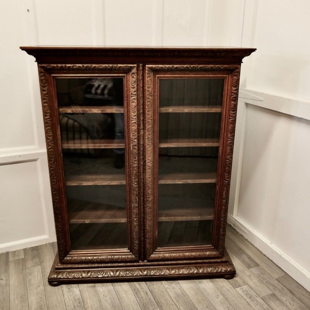 Fine Quality 19th Century Carved Oak Glazed Bookcase. photo furniture
