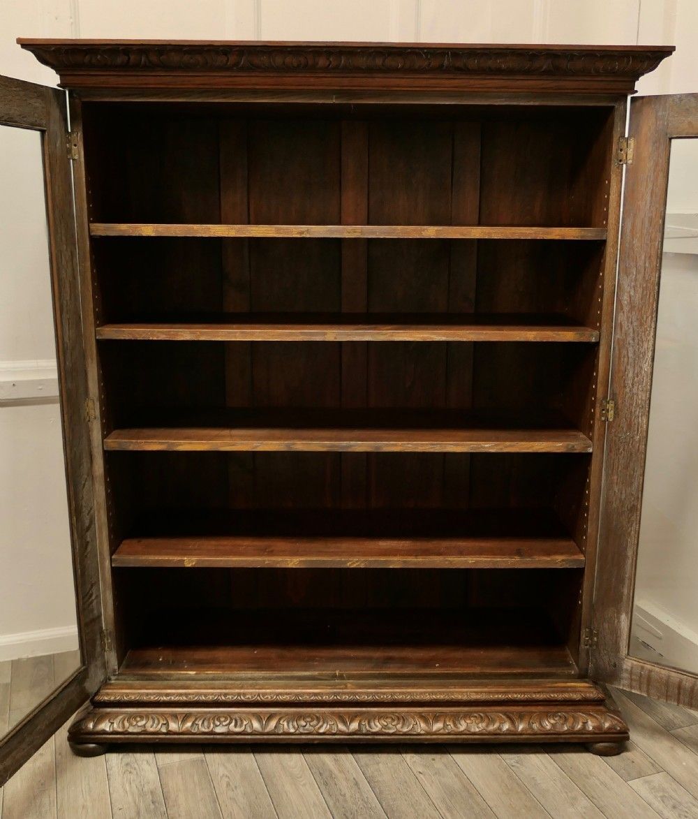 Fine Quality 19th Century Carved Oak Glazed Bookcase. photo 1560.0