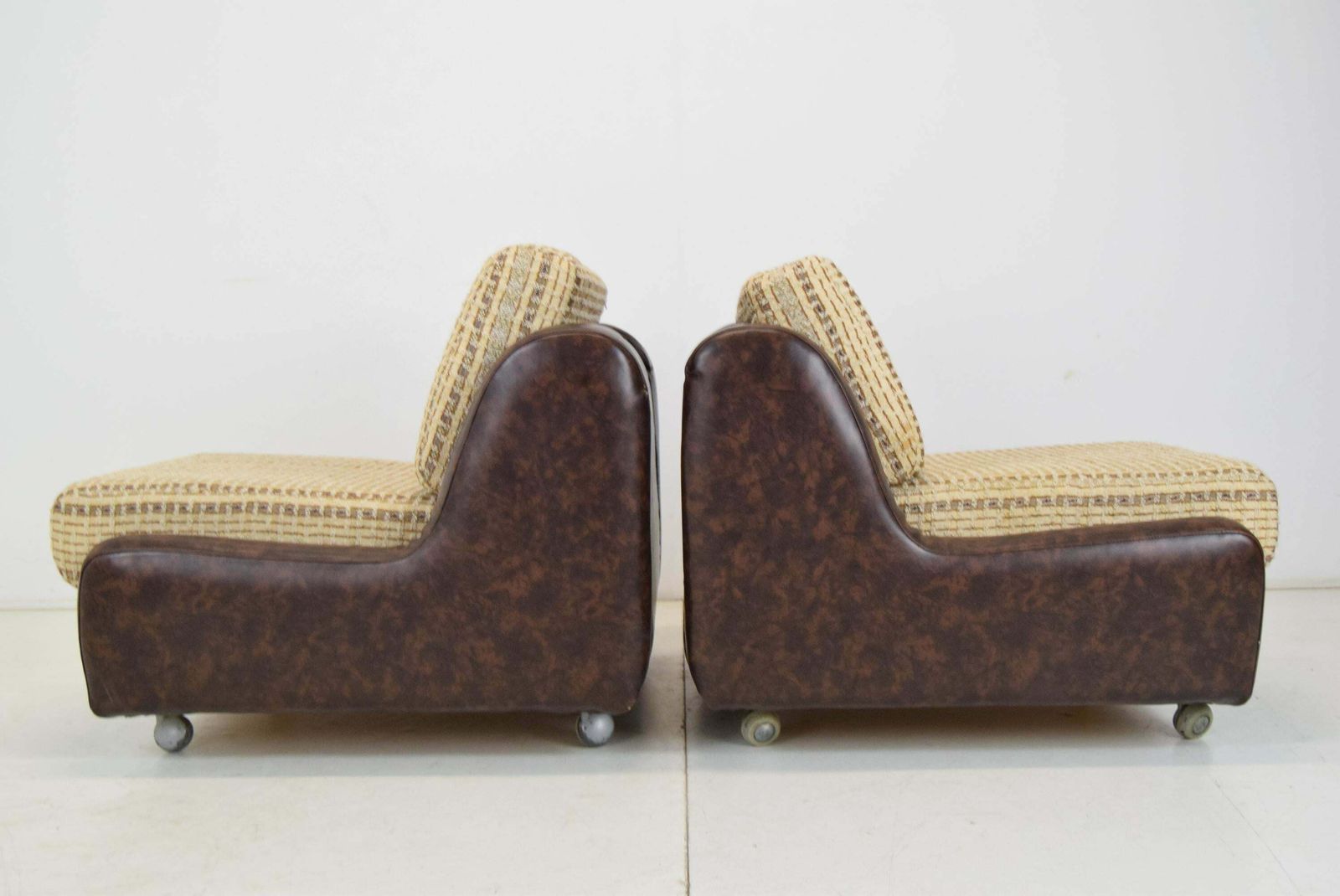 photo vinterior Pair Of Mid Century Leatherette Armchairs On The Wheels,1970's.
