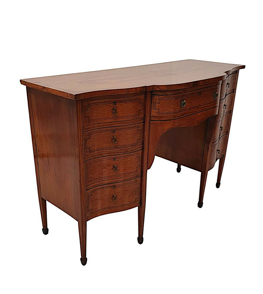 A Fine Edwardian Inlaid Serpentine Sideboard