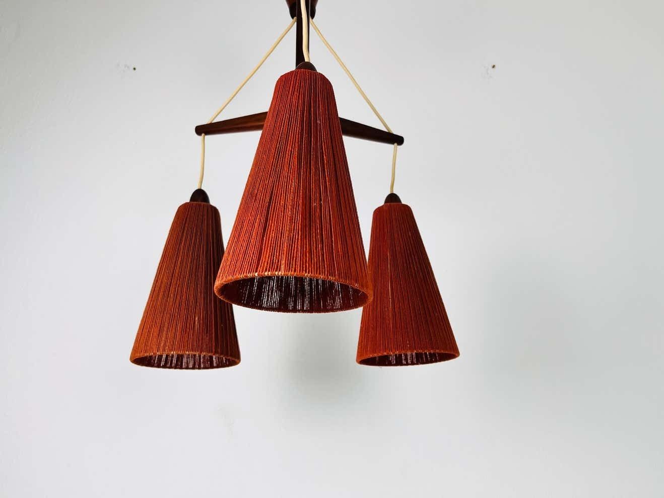 Midcentury Teak And Cord Shade Hanging Lamp By Temde, Circa 1960 photo for sale