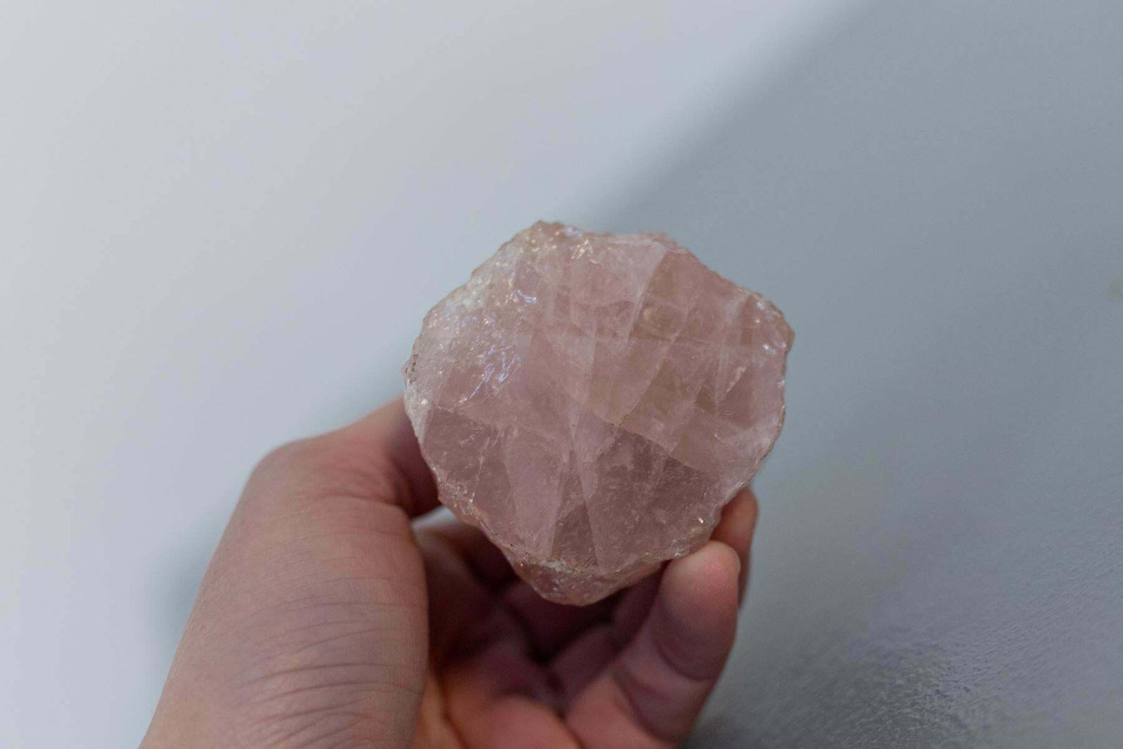 Baroque Statue Of Silver Cherub On Rose Quartz photo vinterior