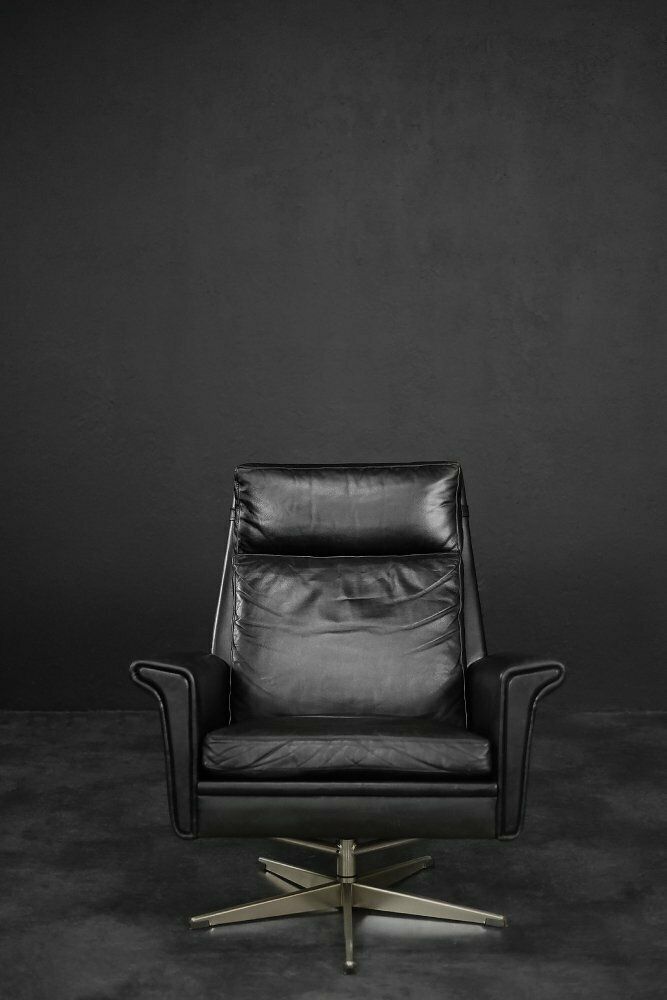 Mid Century Danish Modern Minimalist Black Leather Swivel Armchair By Georg Thams, 1960s photo vinterior