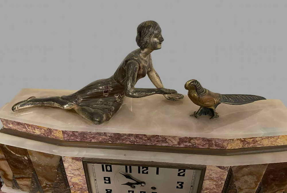 An Attractive French Art Deco Clock By M Secondo photo furniture