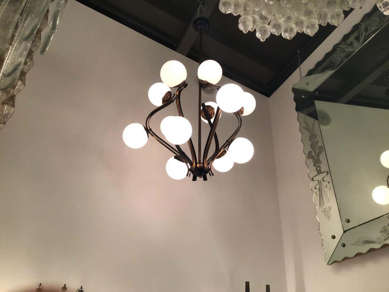 photo vintage Chandelier 12 Lights Iron Brass Opalin Glass 1950, Attributed To Stilnovo C 1955