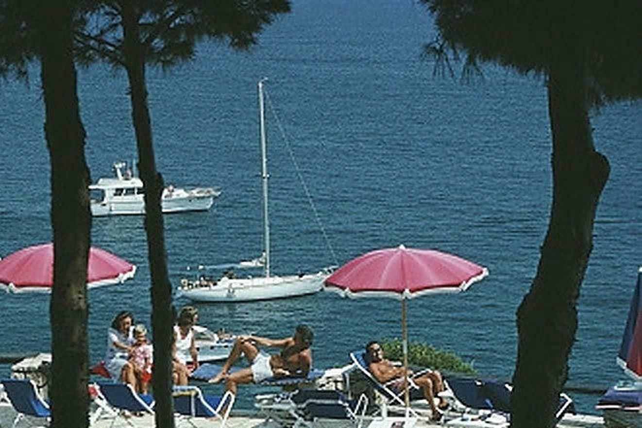 Il Pellicano Hotel Pool By Slim Aarons photo for sale