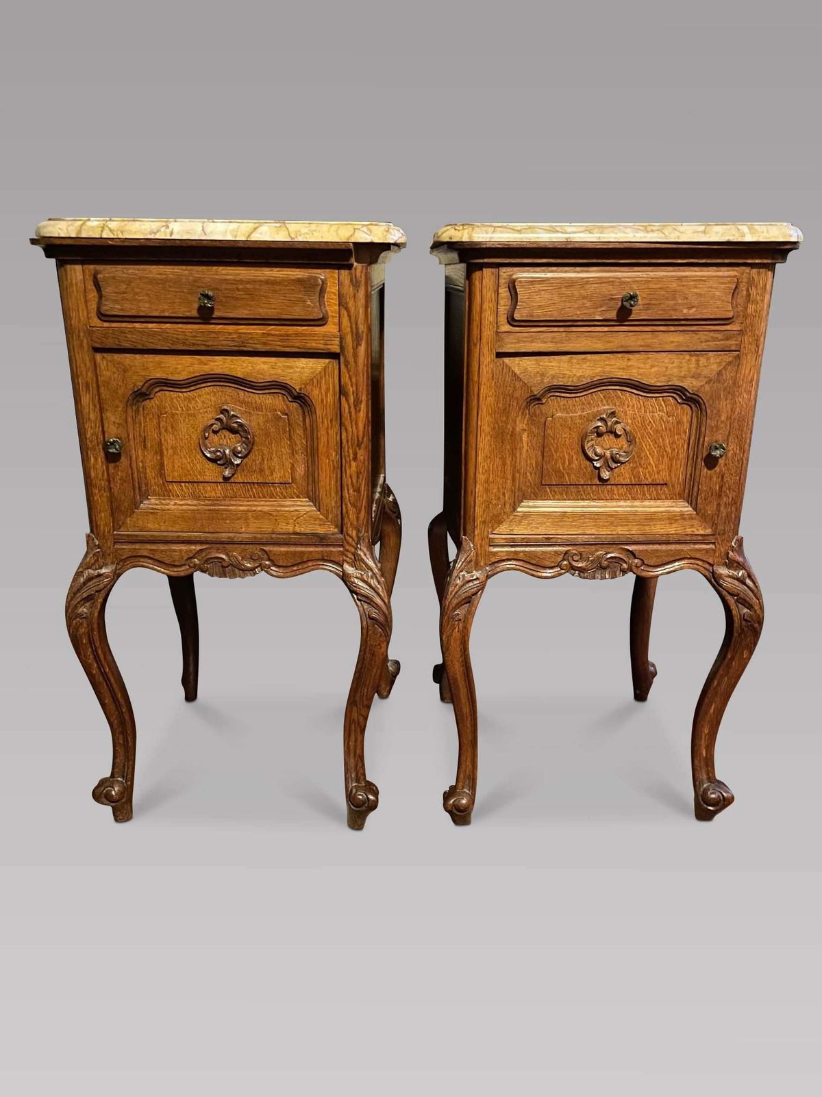 Pair Of French Louis XV Style Oak Bedside Cabinets With Breccia Marble Tops