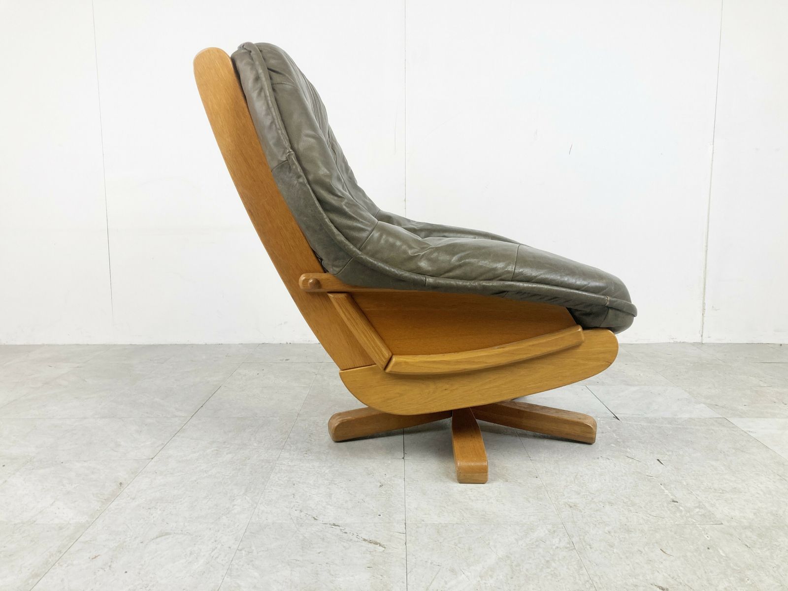Brutalist Oak And Leather Swivel Chair, 1970s photo vinterior