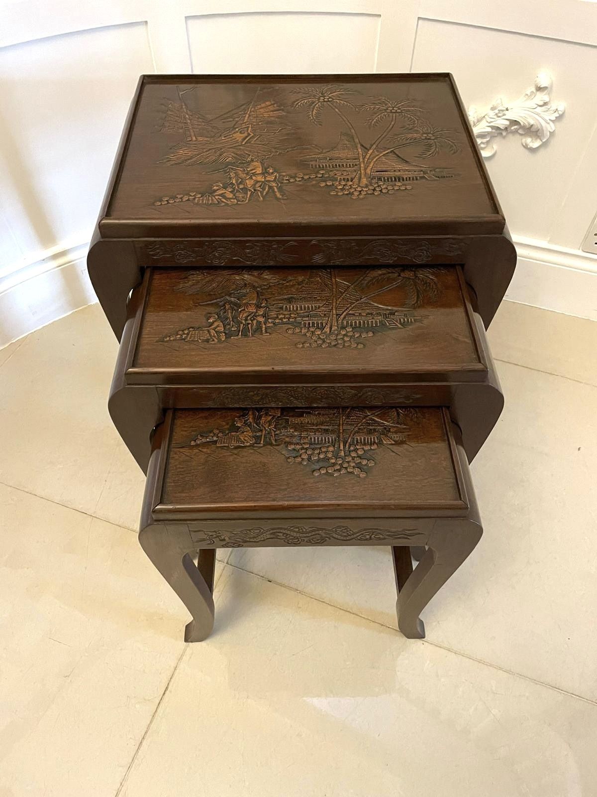 995.0 Antique Carved Teak Nest Of 3 Tables photo