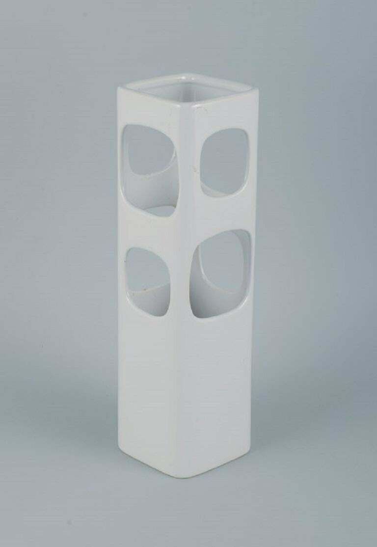 European Studio Ceramicist. Unique Vase With Holes In White Glaze photo furniture