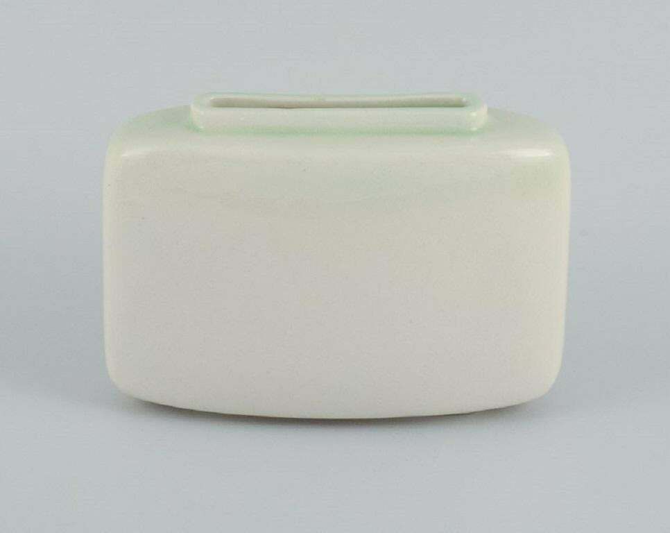 European Studio Ceramist, A Stylish Ceramic Vase In Modernist Form. photo furniture