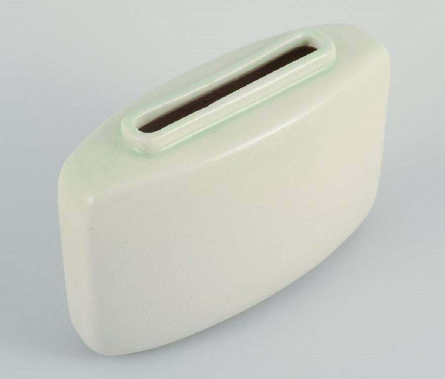 European Studio Ceramist, A Stylish Ceramic Vase In Modernist Form. photo Home Decor